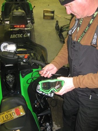 Joey prepping his ice-beating electric goggles