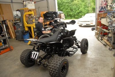 Jeff Tweet and his custom ATV inside his shop