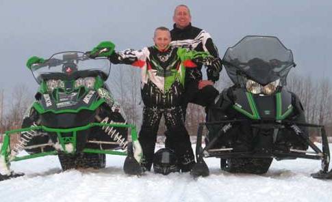 Me and my son Calvin on a snowmobile ride last winter Me and my son Calvin on a snowmobile ride last winter